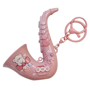 Pink saxophone shaped keychain with cute bear cartoon pendant for bag charm and gift
