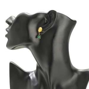 Detailed side view of 18K gold triangle stud earring with green pear-cut gemstone