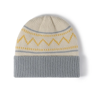 Chunky striped knit beanie with cream crown and grey ribbed cuff for winter warmth