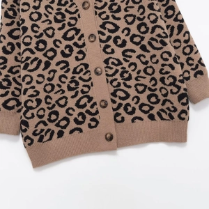 Women's V-neck leopard print knit cardigan with textured buttons and ribbed cuffs