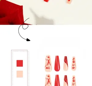 Detail of red French heart and lip print coffin nails with a glossy finish
