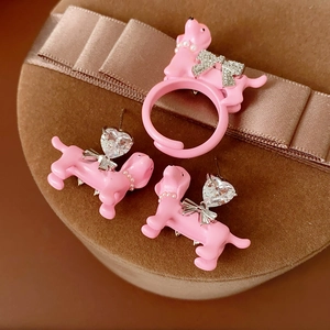 Pink dachshund jewelry set with rhinestones heart bow detail on luxury velvet box