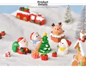Detail view of miniature Christmas resin figurines featuring Santa and snowmen on snow