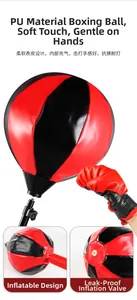 Detail of red and black PU boxing ball showing the inflation hole and air-leakage protection