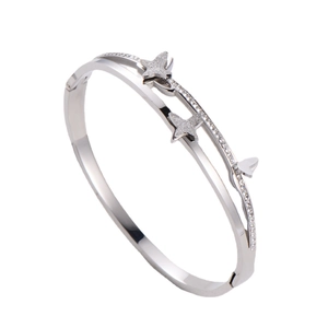 Silver butterfly double-layer bangle with zircon accents on a clean white background