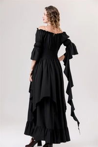Detail of a black gothic renaissance dress with ruffled sleeves and tiered skirt back view