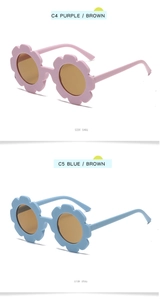 Side view of flower-shaped children sunglasses in pink and blue with brown lenses
