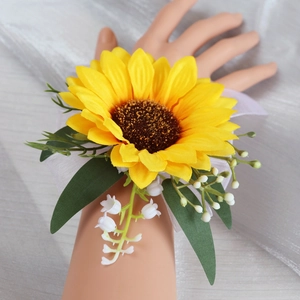 Artificial sunflower wrist corsage with white lilies of the valley and silk ribbon