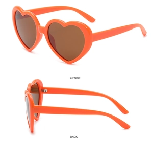 Detail views of orange heart-shaped sunglasses with side and back angles on white background