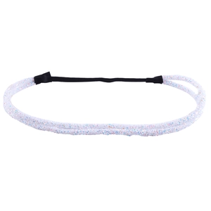 Detail of white headband with rainbow glitter texture and black elastic band