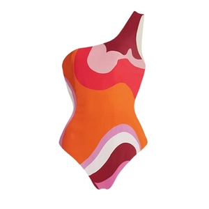 One-shoulder geometric wave print swimsuit with vibrant red and coral hues for women