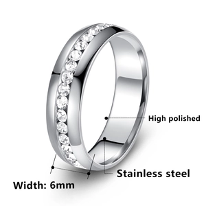 Detail of 6mm polished stainless steel ring featuring a row of clear round crystals