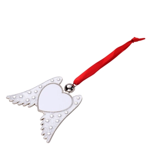 Close-up of white sublimation heart pendant with silver wings and red ribbon cord