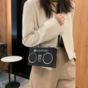 Creative vintage radio shaped crossbody bag in black leather for a stylish retro look
