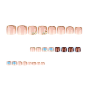 24-piece set of luxury faux toenails with glitter french tips, rhinestones, and marble designs