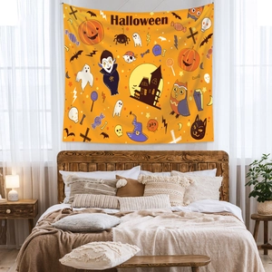 Detail of Halloween tapestry with pumpkin and ghost icons hanging on a bedroom wall