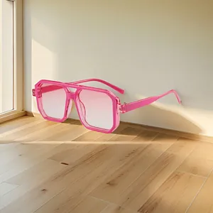 Pink transparent oversized square sunglasses with gradient lenses in a minimalist setting