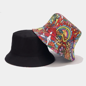 Stylish reversible bucket hat featuring graffiti mushroom prints and classic solid black