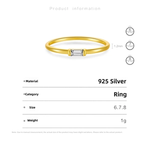 Detail view of gold-plated S925 silver ring with baguette-cut zircon and size chart
