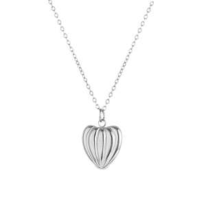 Detail of silver titanium heart pendant with textured vertical stripes on a fine chain