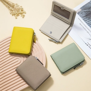 Cartera fina de cuero para mujer con protección RFID y bolsillo con cremallera
