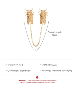 Detail of linked gold alloy cicada brooches with fine chain showing 22cm total length