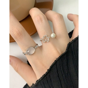 S925 silver open ring featuring a hollow flower and elegant bread pearl with stones