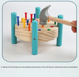 Detail of wooden pounding bench toy with colorful pegs and hammer for motor skills