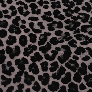 Close-up of purple mesh fabric with black leopard print and breathable flocked texture