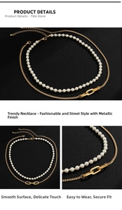 Close-up of double-layer necklace featuring white faux pearls and gold oval link chain