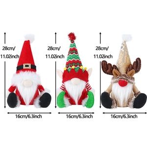 Three Christmas gnomes with Santa, elf and reindeer designs, 28cm tall holiday ornaments