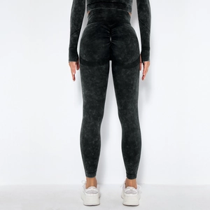 Detail of dark grey seamless yoga leggings with scrunch butt lift and acid wash texture