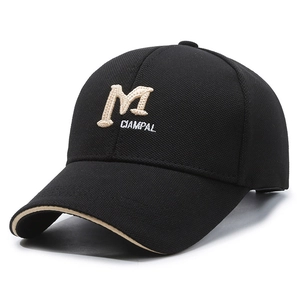 Classic black cotton baseball cap featuring khaki M letter embroidery and a curved brim