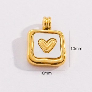 Detail view of 10mm square gold titanium steel pendant with white shell heart inlay