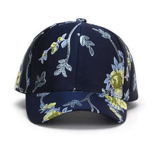 Floral print baseball cap in navy blue with vintage botanical embroidery and sun visor
