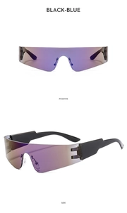 Detail of Y2K rimless sunglasses showing black-blue gradient lenses and wide temples