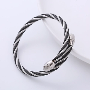 Classic silver and black twisted cable wire bangle with metal sphere end caps