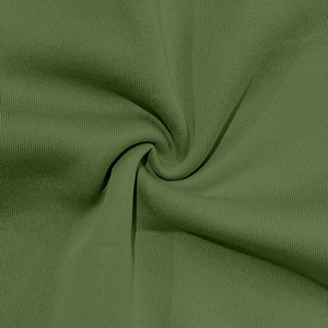 Macro shot of olive green ribbed knit fabric showing soft texture and vertical patterns