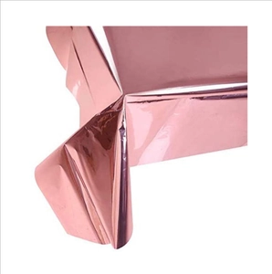 Close-up of rose gold disposable PET tablecloth with metallic gloss draping detail