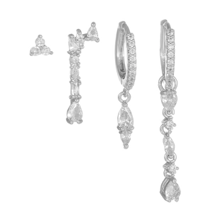 Macro detail of silver drop earring set featuring mixed-cut cubic zirconia and stud