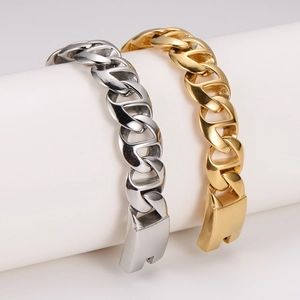 Classic silver and gold cuban link stainless steel bracelets on white display