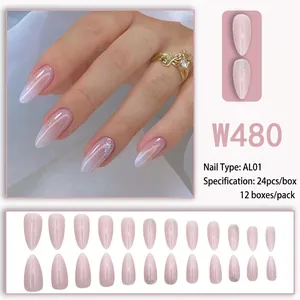 Pink gradient long almond press-on nails with silver glitter accents and glossy finish