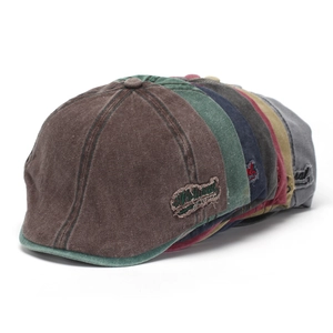 Various colors of washed denim flat caps with retro embroidery detail for men and women