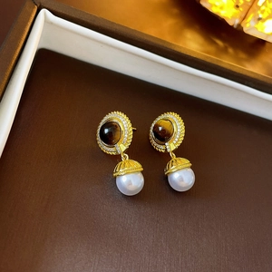 Vintage style gold earrings with brown cat-eye stone, diamonds and white pearl