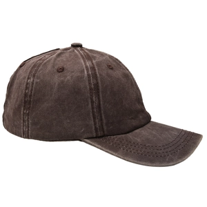 Detail of washed cotton baseball cap showing textured fabric and stitching in charcoal