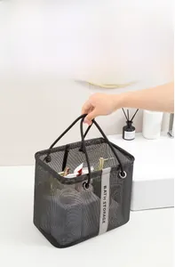 Mesh bath storage bag with reinforced handles and transparent material detail