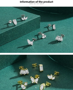 Detailed view of S925 silver stud earring set with zircons in gold and silver finish