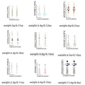 Detailed grid showing pearl tassel earrings with precise dimensions and weight specs