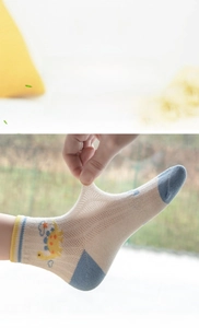 Elastic mesh summer kids socks with breathable cotton and cute yellow dinosaur print