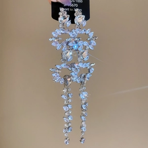 Detail of S925 silver fringe earrings with sparkling cubic zirconia tassels